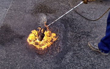 Over Silton flat roofing repairs